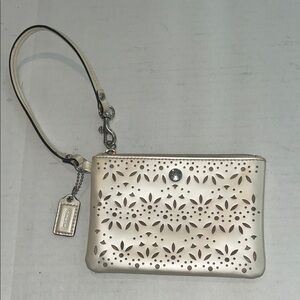 COACH perforated leather pearl white leather wristlet